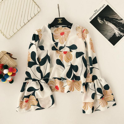 Γυναικεία μπλούζα με βολάν και floral μοτίβα σε διάφορα χρώματα