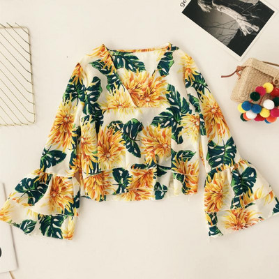 Γυναικεία μπλούζα με βολάν και floral μοτίβα σε διάφορα χρώματα
