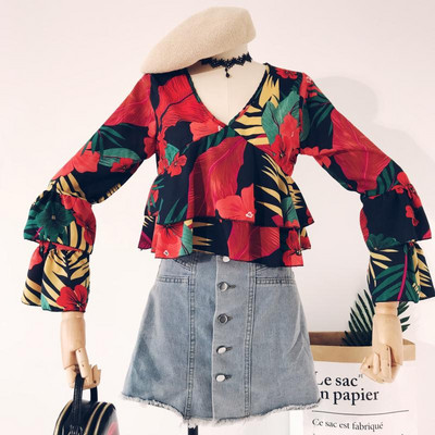 Γυναικεία μπλούζα με βολάν και floral μοτίβα σε διάφορα χρώματα