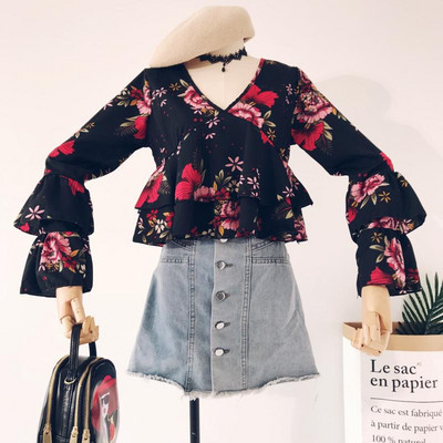 Γυναικεία μπλούζα με βολάν και floral μοτίβα σε διάφορα χρώματα