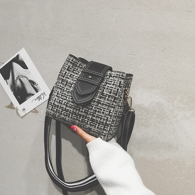 Κομψή γυναικεία τσάντα με μικρή και μακρά λαβή