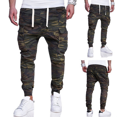 Casual men`s trousers with side pockets and camouflage pattern