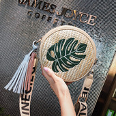 Κυκλική γυναικεία τσάντα με φούντες και διάφορα κεντήματα