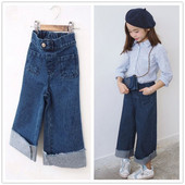 Μοντέρνα παιδικά τζιν για τα κορίτσια σε σκούρο χρώμα