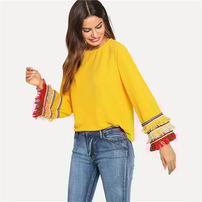Γυναικεία μπλούζα με φαρδιά μανίκια και κρόσσια σε κίτρινο χρώμα