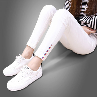 Κομψά γυναικεία τζιν σε διάφορα χρώματα με πλευρικές λωρίδες