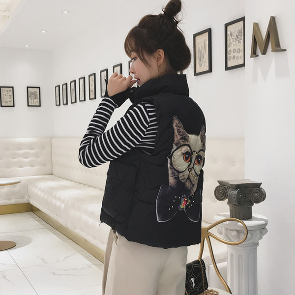 Női mellény fekete és narancssárga hátoldalán mintával