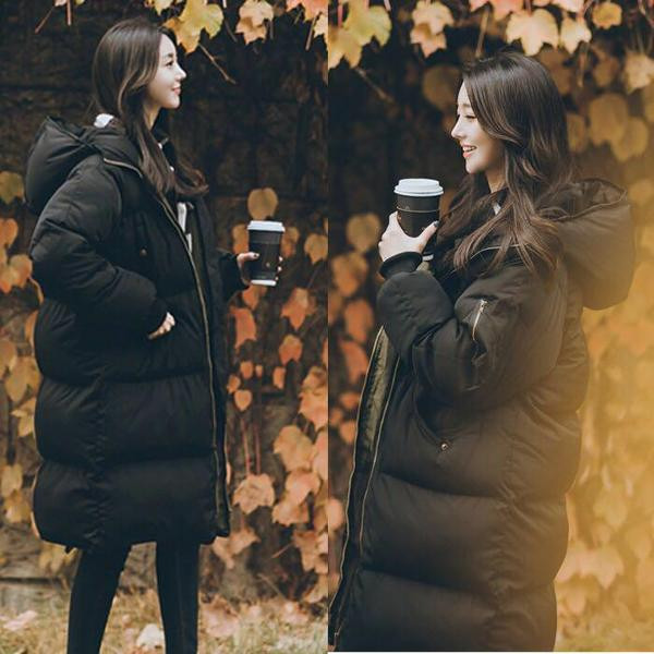 Hosszú fekete kabát kapucnival, férfiaknak és nőknek egyaránt