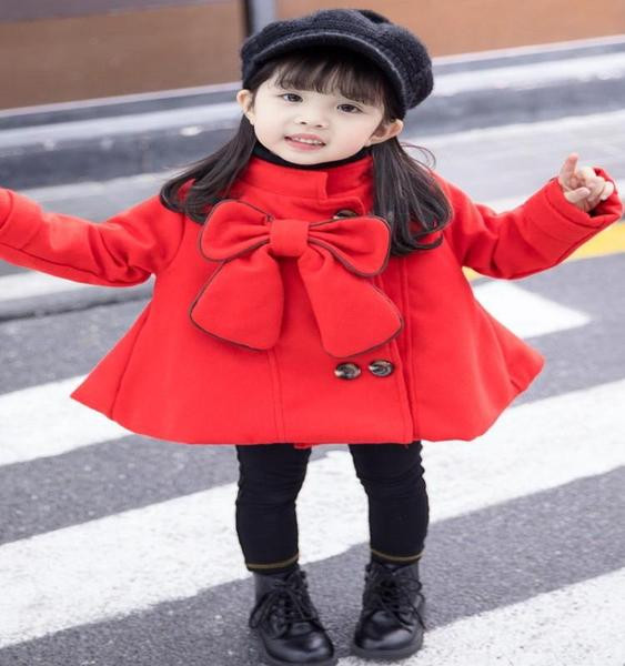 Stílusos gyerekkabát lányoknak, széles modell kétszínű szalaggal