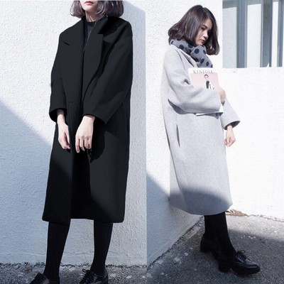 Дълго дамско зимно палто с джобове в сив и черен цвят