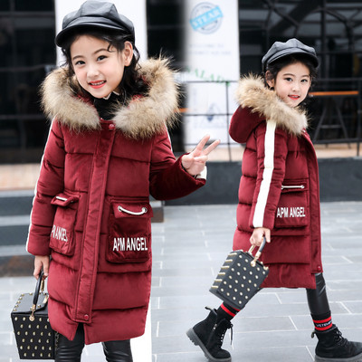 Κομψό παιδικό χειμωνιάτικο μπουφάν με επιγραφές και γούνα στη κουκούλα