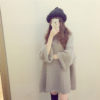 Női pulóver széles modell 7/8-as ujjal, több színben