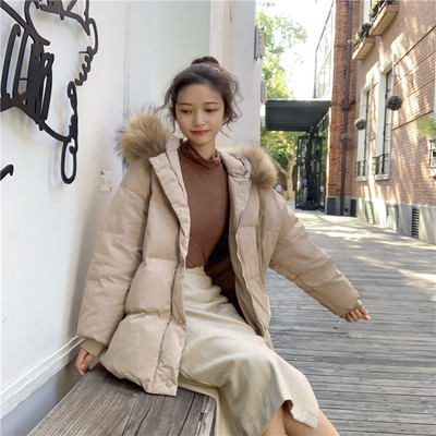 Модерно дамско яке в бежов цвят с качулка и пух