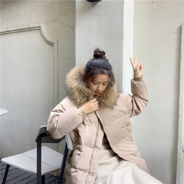 Модерно дамско яке в бежов цвят с качулка и пух