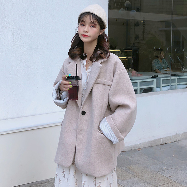 Дамско палто в два цвята с джобове и раирана подплата