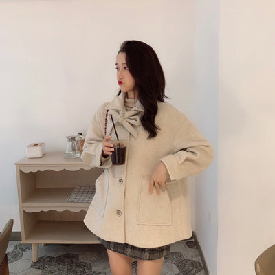 Модерно дамско палто с връзки и джобове в два цвята