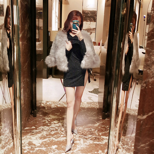 Модерно дамско пухено яке в бял цвят