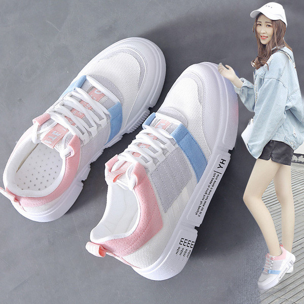 Τρέχοντα λευκά κυρίες παπούτσια