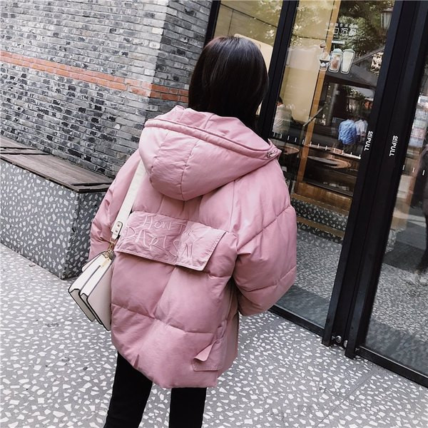 Női kabát fehér és rózsaszín széles modellben