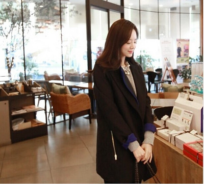 Modern női kabát oldalsó cipzárral szürke és fekete színben