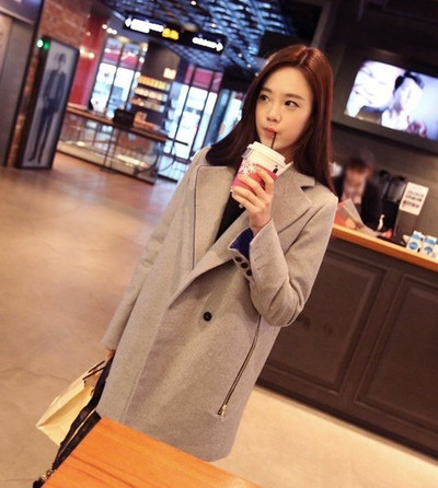 Modern női kabát oldalsó cipzárral szürke és fekete színben