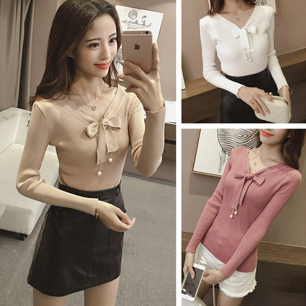 Modern női pulóver szalaggal és gyöngyökkel több színben