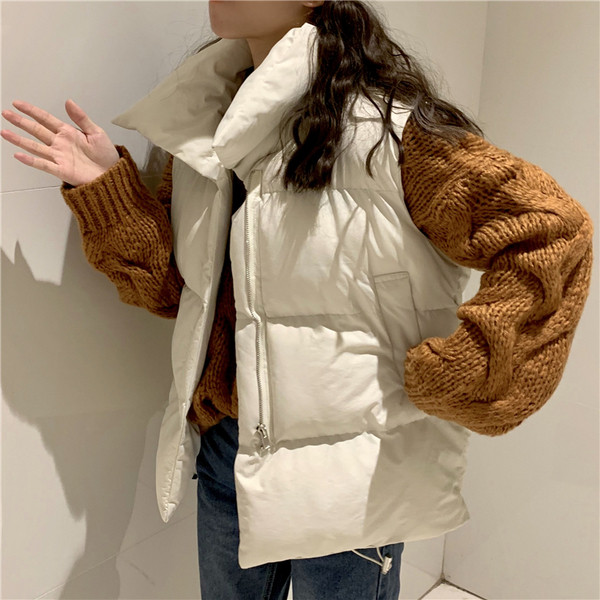 Hétköznapi női mellény fehér és fekete színben