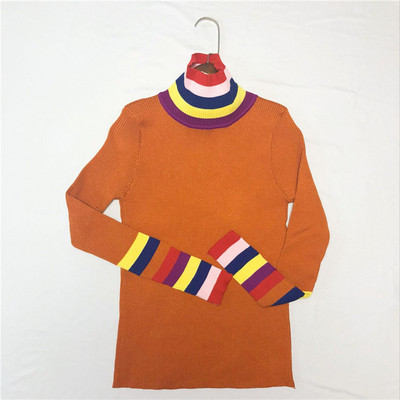 Modern női pulóver magas gallérral, színes szalagokkal több színben