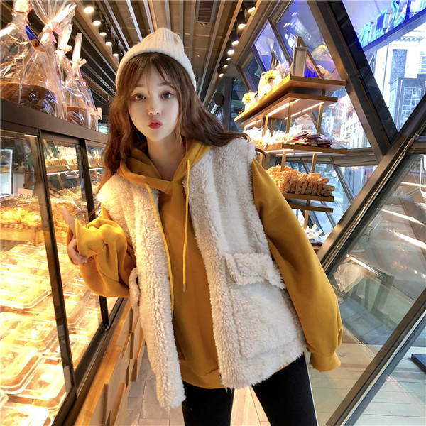 Modern női pehelymellény zsebekkel, két színben