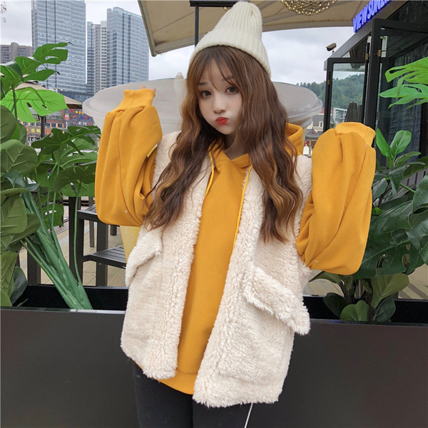 Modern női pehelymellény zsebekkel, két színben