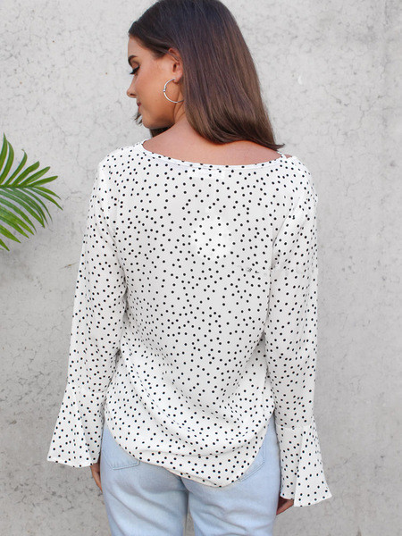 Női pöttyös blúz kereszt pántokkal több színben