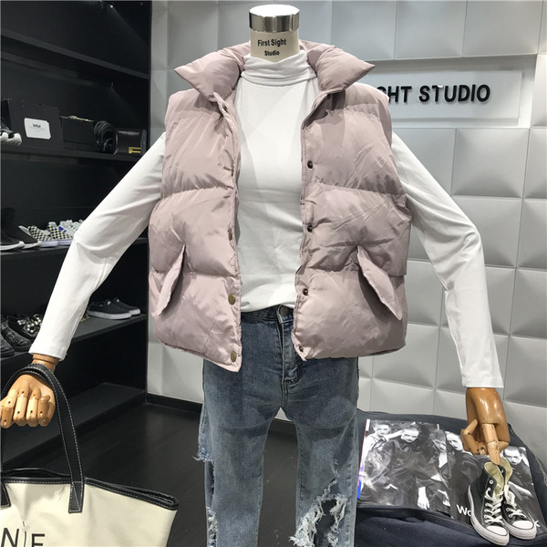 Aktuális női mellény széles modell fehér, rózsaszín, fekete és szürke színekben