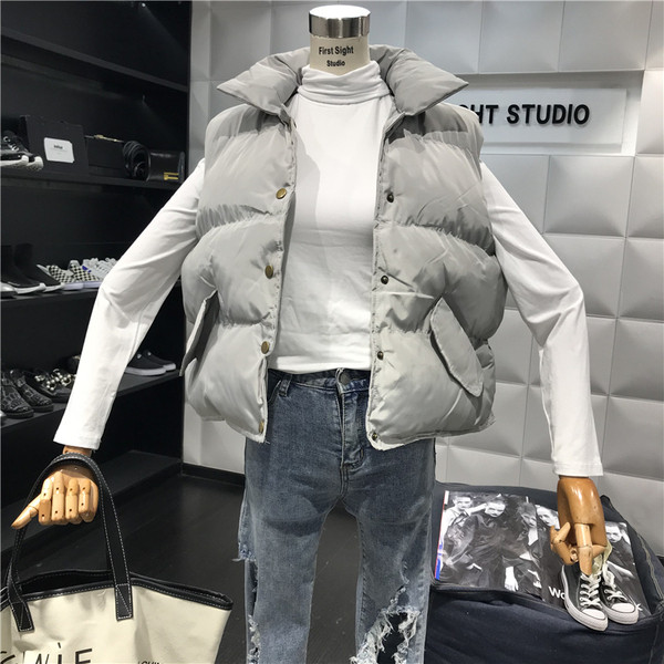 Aktuális női mellény széles modell fehér, rózsaszín, fekete és szürke színekben