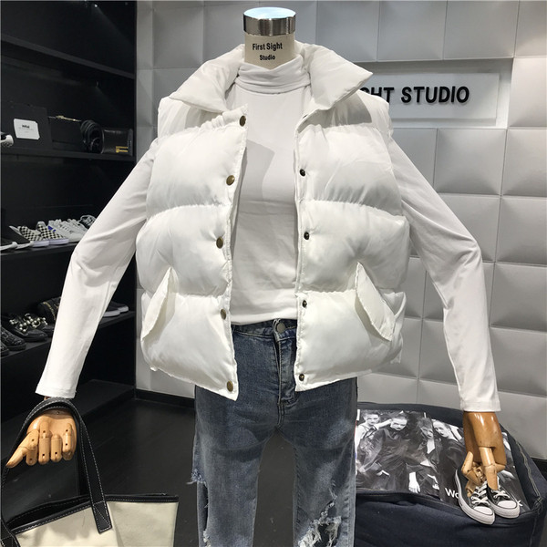 Aktuális női mellény széles modell fehér, rózsaszín, fekete és szürke színekben