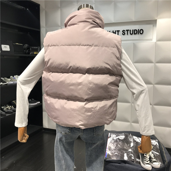 Aktuális női mellény széles modell fehér, rózsaszín, fekete és szürke színekben