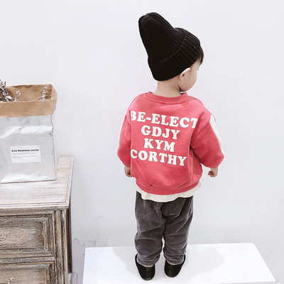 Απλό πουλόβερ σε δύο χρώματα με σημάδι στην πλάτη