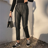 Aktuális női nadrág eko bőrből gumis derékkal, fekete színben