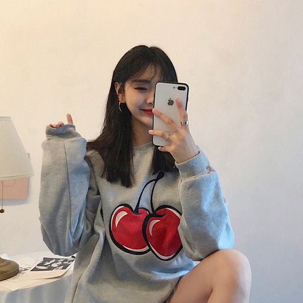 Női blúz több színű mintával