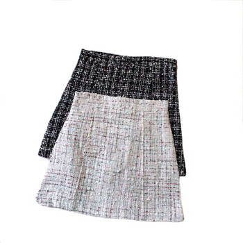 Fekete-fehér rövid női szoknya magas derékkal