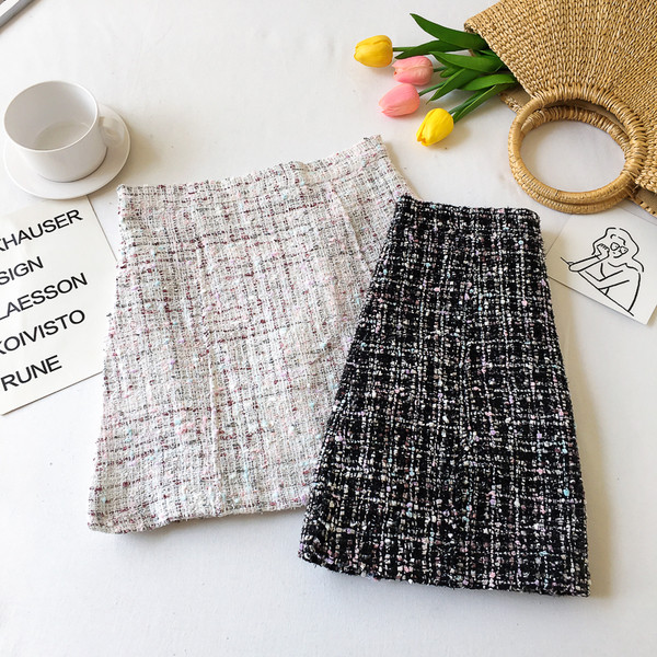 Fekete-fehér rövid női szoknya magas derékkal