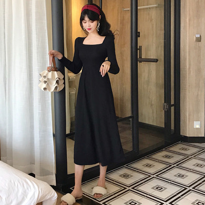 Модерна дамска рокля с дълъг ръкав и отворен гръб в черен цвят