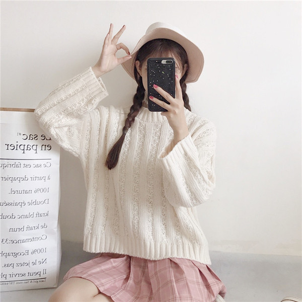 Modern női pulóver széles ujjal, két színben