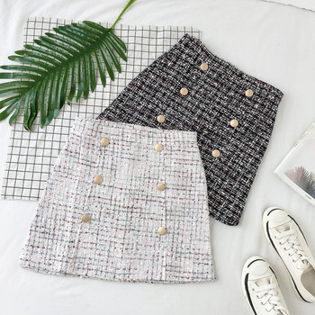 Aktuális női szoknya fekete-fehér gombokkal