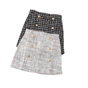 Aktuális női szoknya fekete-fehér gombokkal