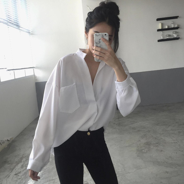 Cămașă elegantă de damă cu buzunar alb-negru