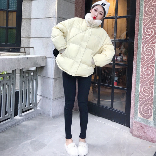 Stílusos női kabát pehelygallérral, két színben