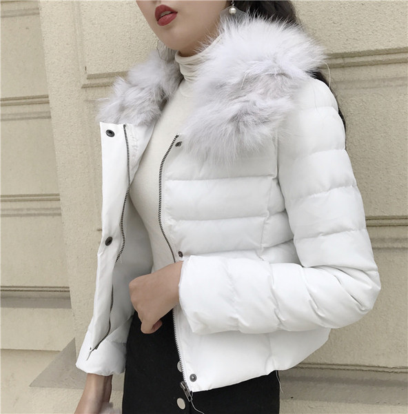 Модерно дамско яке в бял и черен цвят и пух