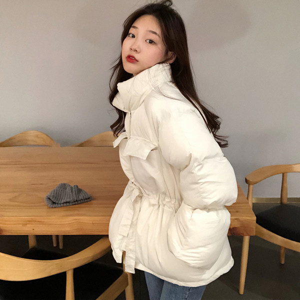 Női kabát fehér és fekete színben