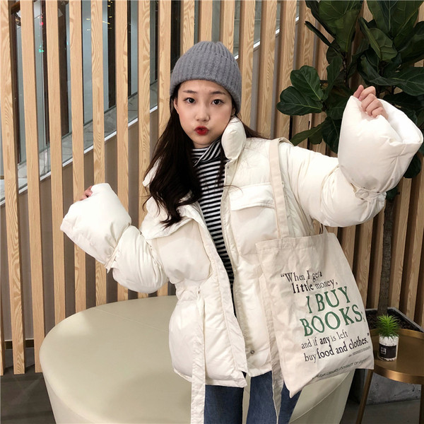 Női kabát fehér és fekete színben