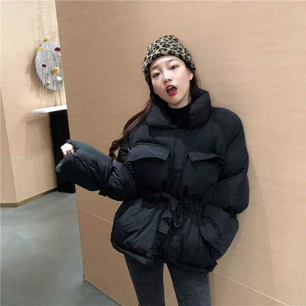 Női kabát fehér és fekete színben